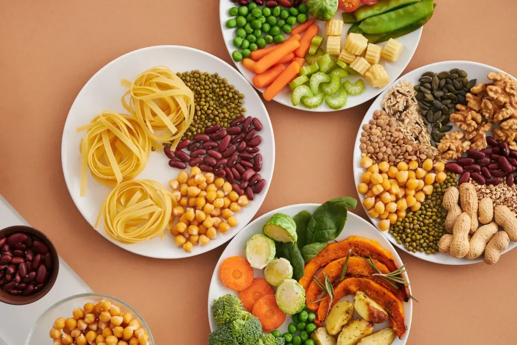 Assiette équilibrée avec légumes colorés, protéines maigres et céréales complètes sur un plan de travail